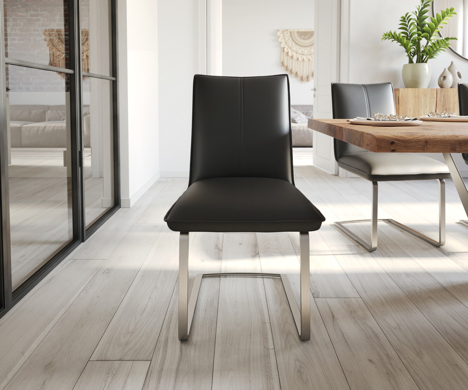 Cantilever Lelio-Flex cuir de vache noir pied cantilever plat acier inoxydable brossé ressorts ensachés 1