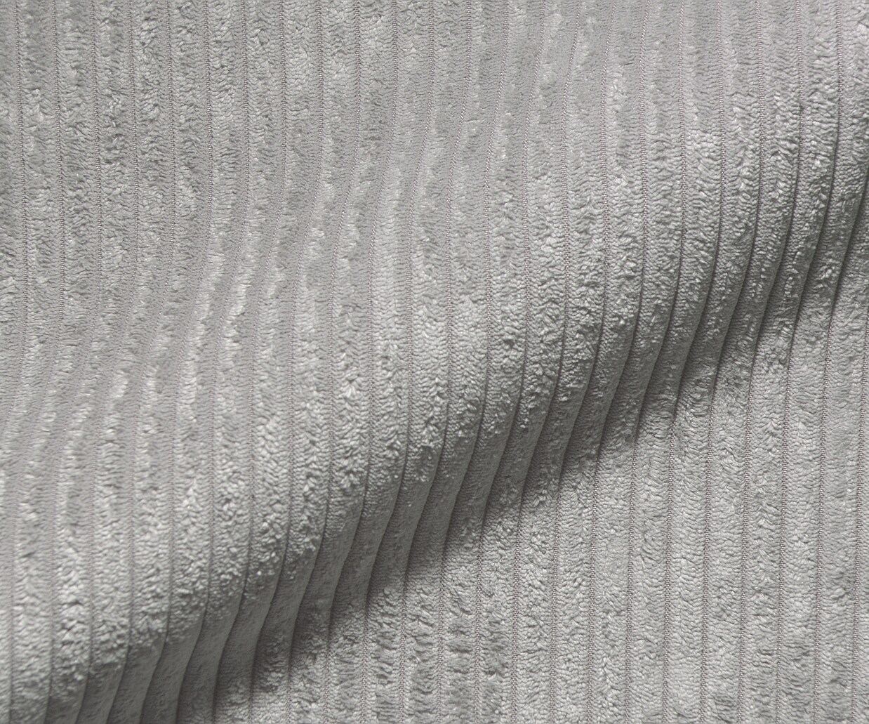 Chaise-pivotante Nube-Flex côtelé gris argenté pied croisé large aspect titane pivotement sur 360° ressorts ensachés 3