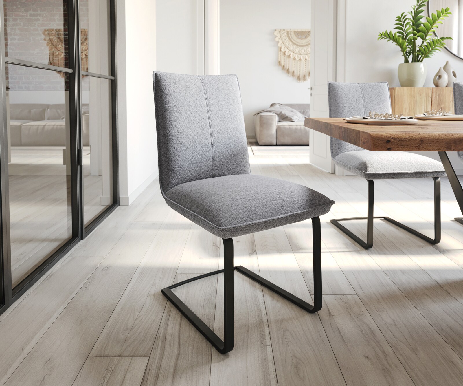 Schwingstuhl Lelio-Flex Strukturstoff Hellgrau Freischwinger flach Schwarz  Taschenfederkern