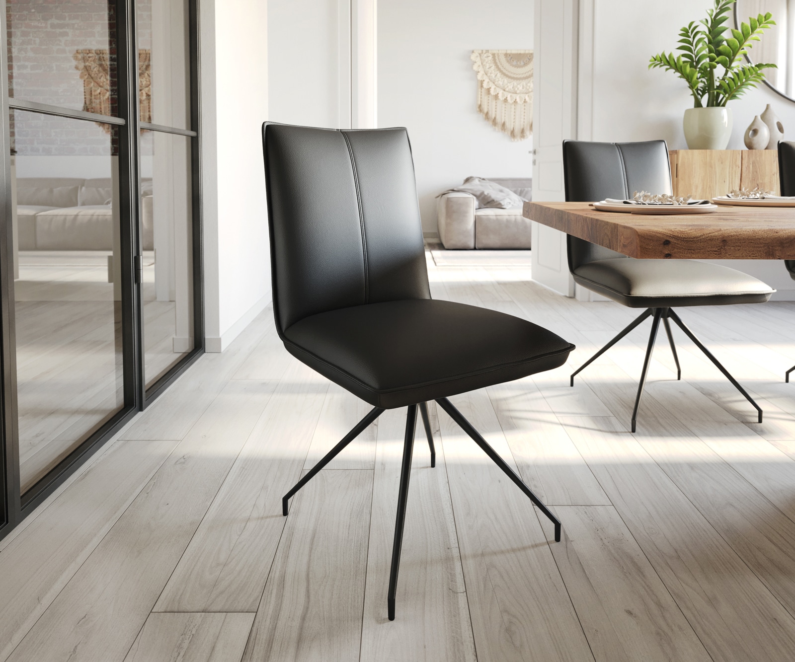 Chaise-de-salle-à-manger Lelio-Flex cuir de vache noir pied croisé conique noir ressorts ensachés
