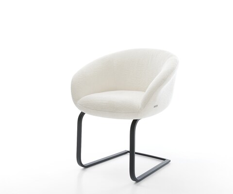 Cantilever Vinka-Flex avec accoudoirs bouclé doux beige pied cantilever plat noir resorts ensachés