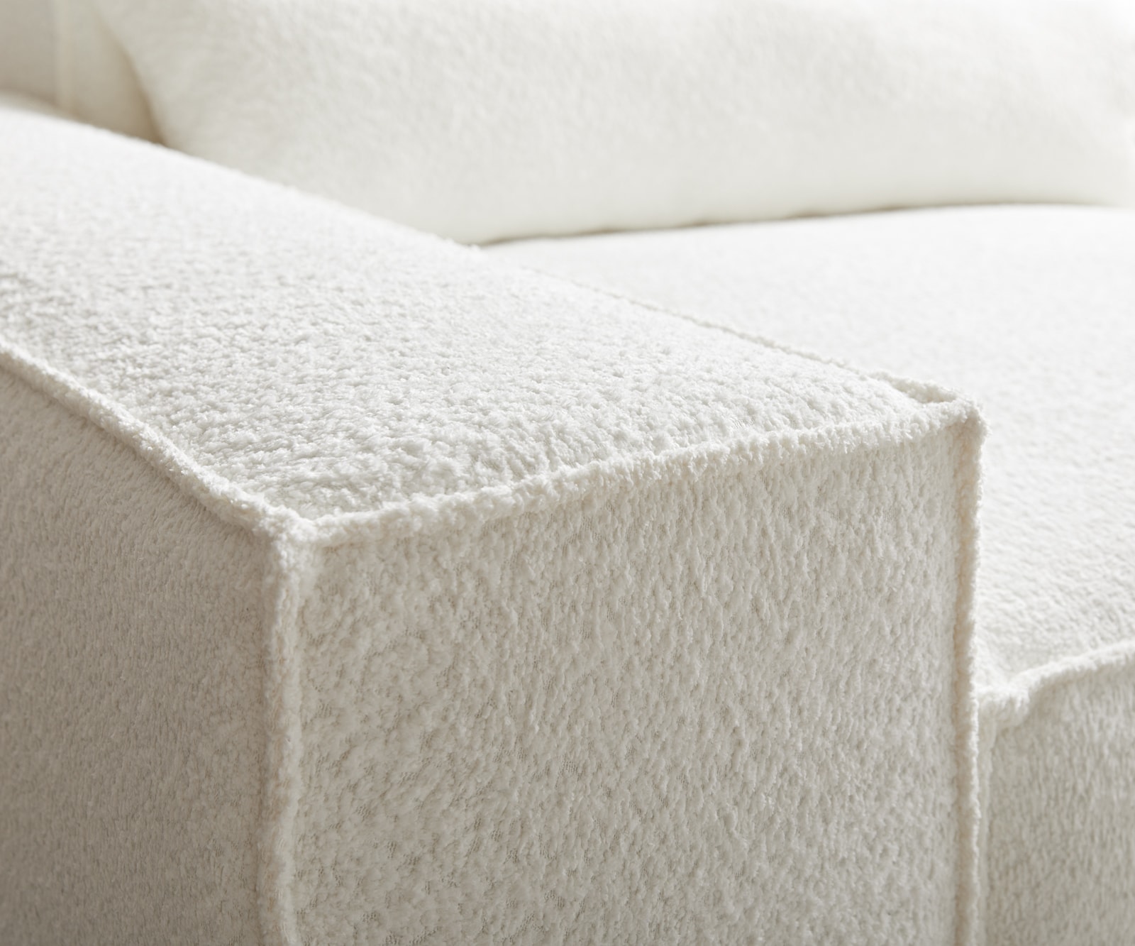 Ecksofa Sirpio 230x150 cm Bouclé Creme-Weiß Recamiere variabel mit Hocker 3