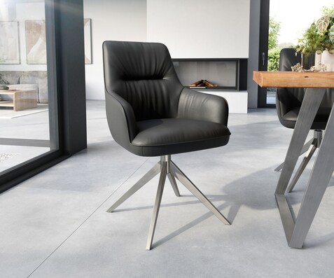 Chaise-de-salle-à-manger Zelia-Flex avec accoudoirs cuir de vache noir pied croisé large acier inoxydable brossé ressorts ensachés