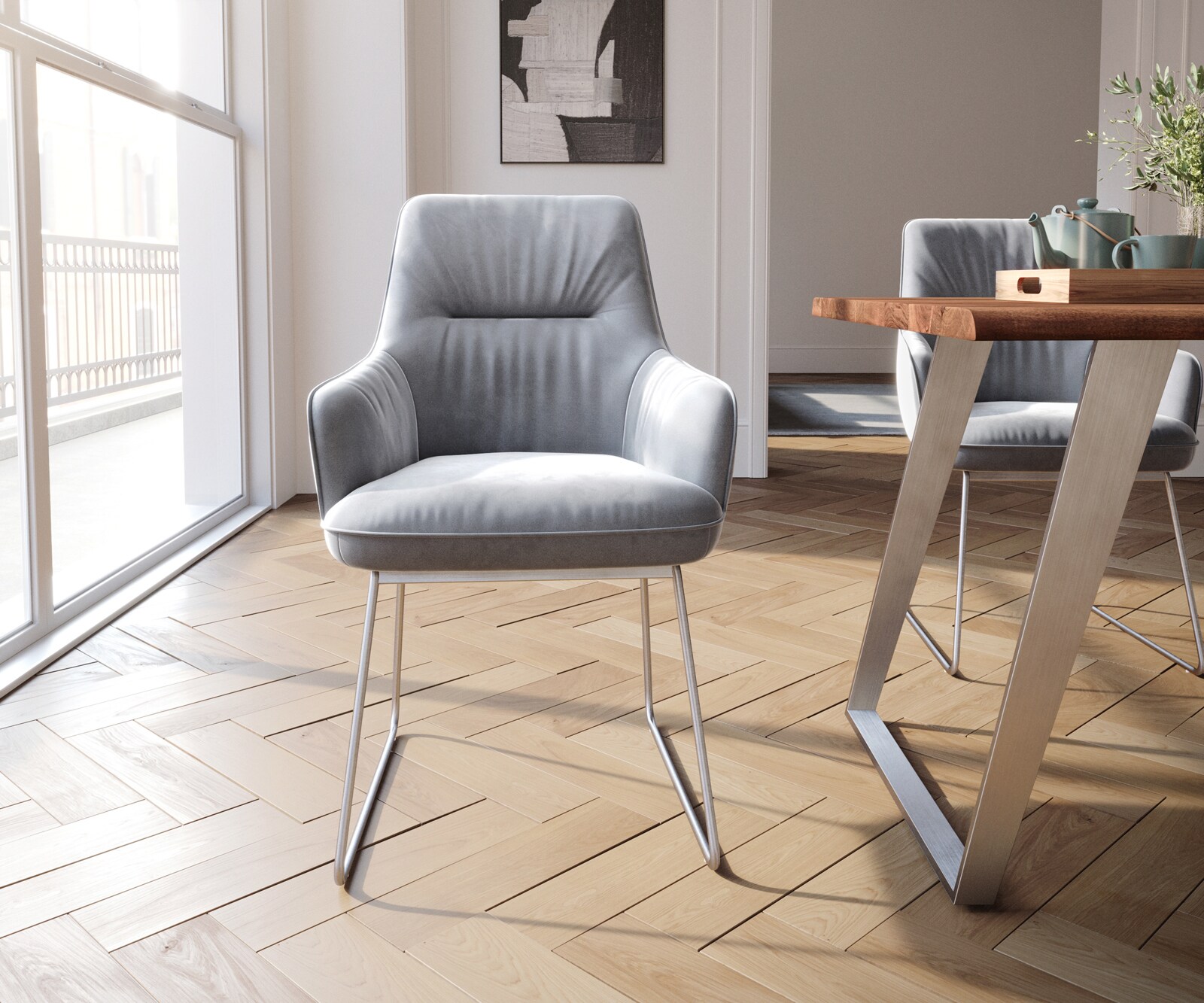 Chaise-de-salle-à-manger Zelia-Flex avec accoudoirs velours gris pied trapèze acier inoxydable brossé ressorts ensachés 1