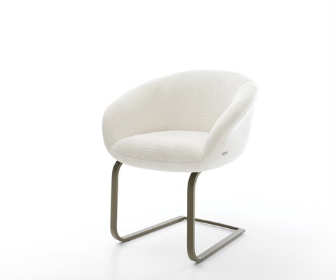 Cantilever Vinka-Flex avec accoudoirs bouclé doux beige pied cantilever plat aspect titane resorts ensachés