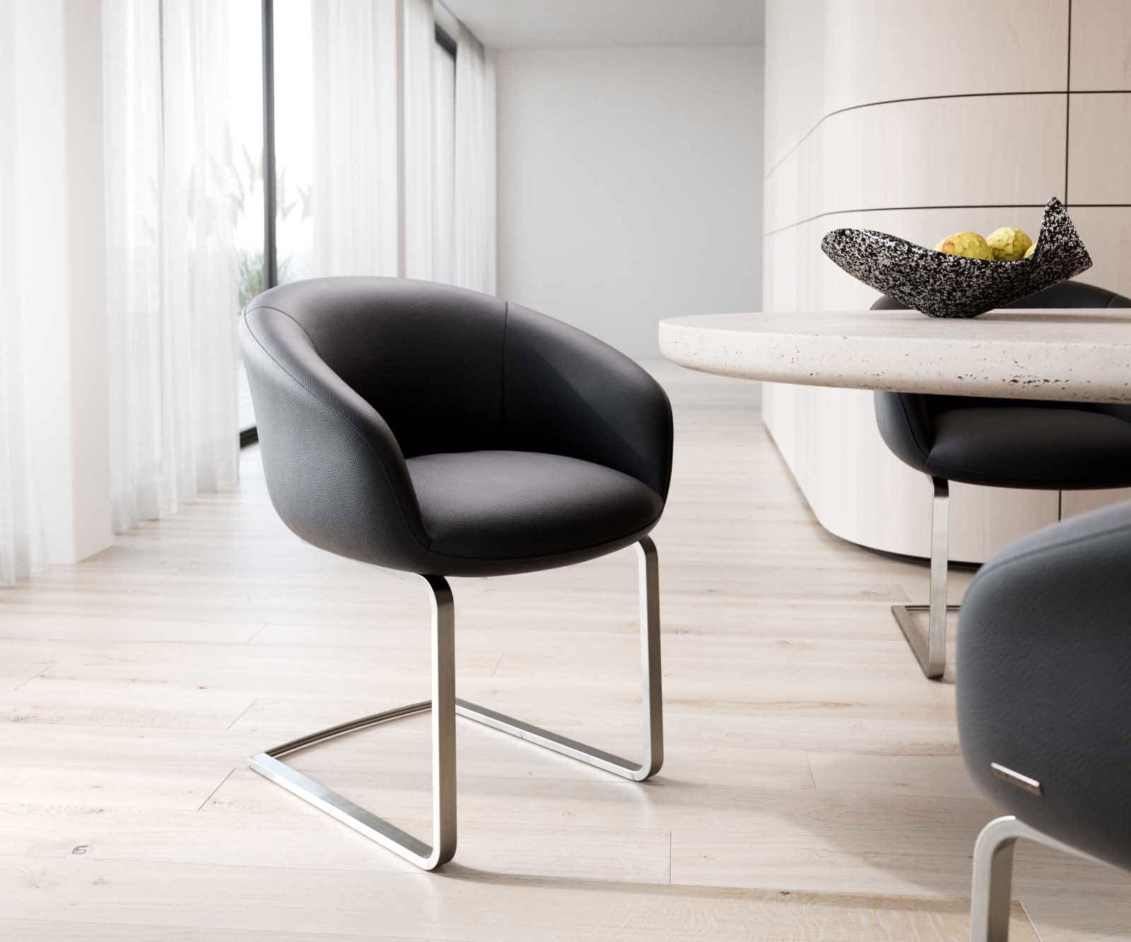 Freischwinger Vinka-Flex mit Armlehnen Echt-Leder Schwarz Freischwinger flach Edelstahl Taschenfederkern Freischwinger Vinka-Flex mit Armlehnen Echt-Leder Schwarz Freischwinger flach Edelstahl Taschenfederkern