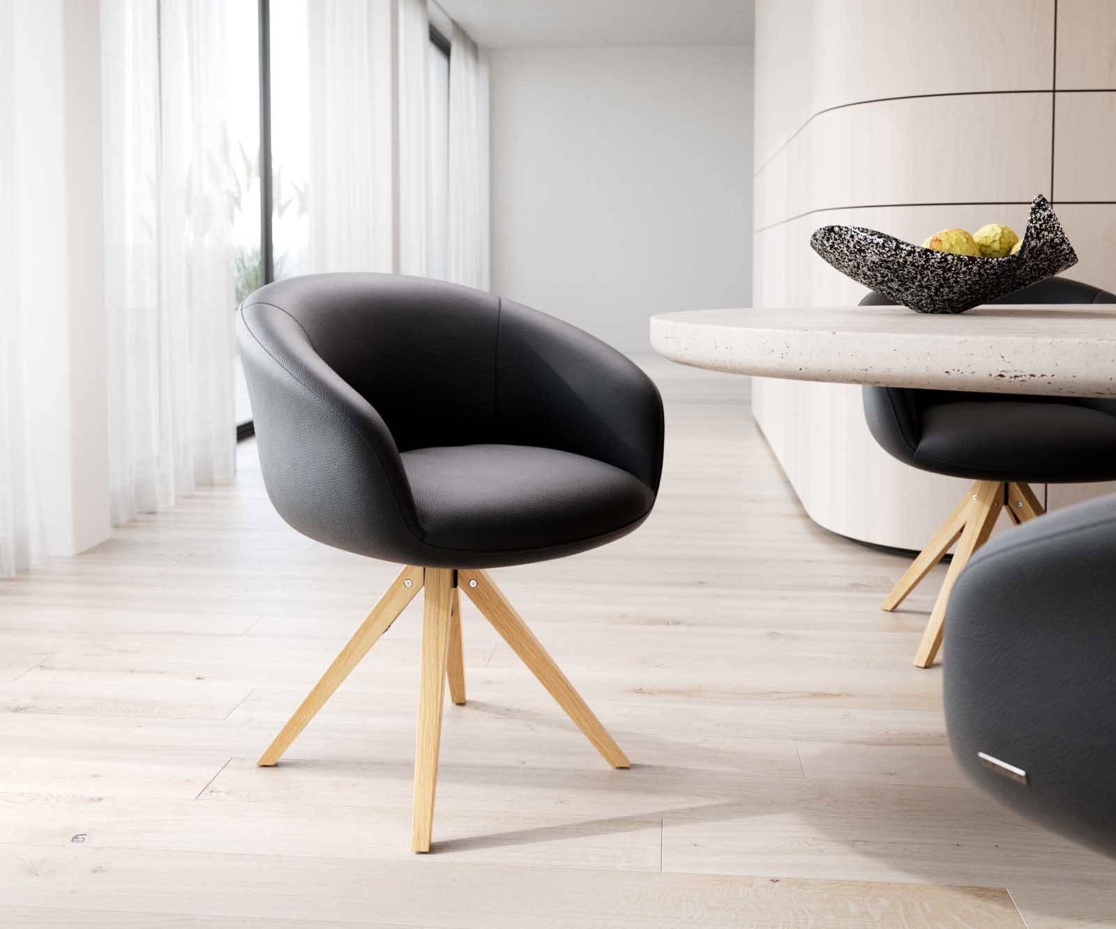 Drehstuhl Vinka-Flex mit Armlehnen Echt-Leder Schwarz Holzgestell kantig Natur 180° drehbar Taschenfederkern Drehstuhl Vinka-Flex mit Armlehnen Echt-Leder Schwarz Holzgestell kantig Natur 180° drehbar Taschenfederkern